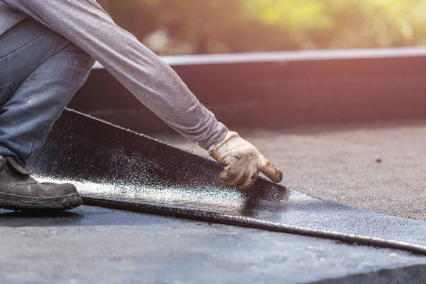 Professional Basement Waterproofing technician working in Dansville, NY
